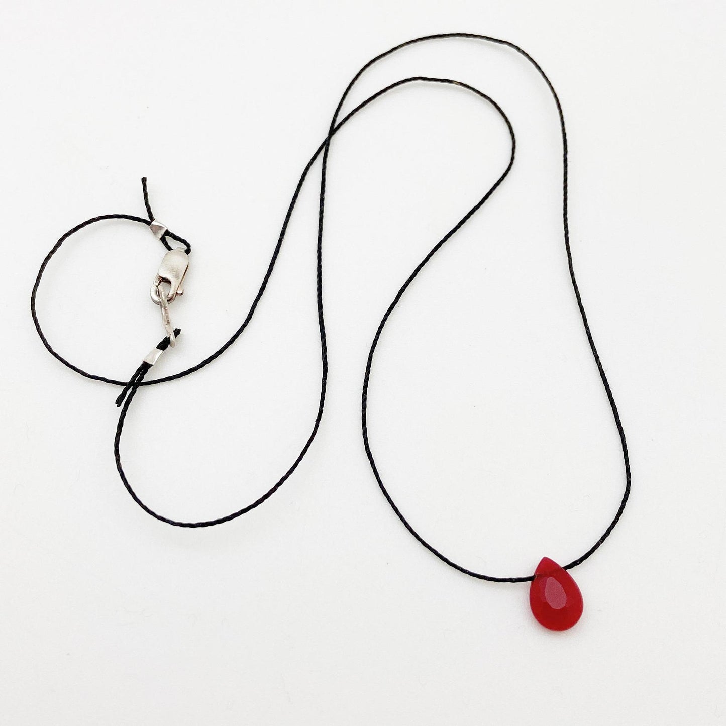 Necklace - Faceted Polished Carnelian on Woven Fiber