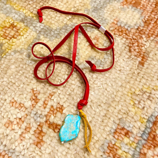 Necklace - Turquoise Slice with Sterling and Leather Tassel on Red Leather