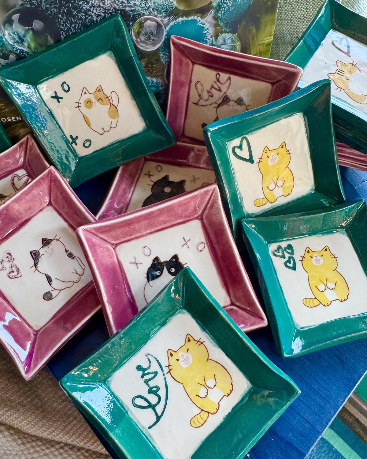 Handmade ceramic cat tray with a playful cat design