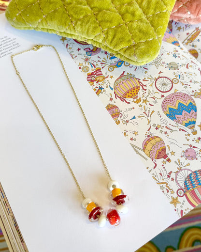 Lifesaver Glass Bead Necklaces

The graduated sizes and varied shapes of these playful “Lifesaver” beads create wonderful movement when worn. Some designs feature joyful monochromatic color combinations, while others mix vibrant colors for a more expressive, energetic look. Each necklace has its own personality, from softly coordinated to bright and unexpected.