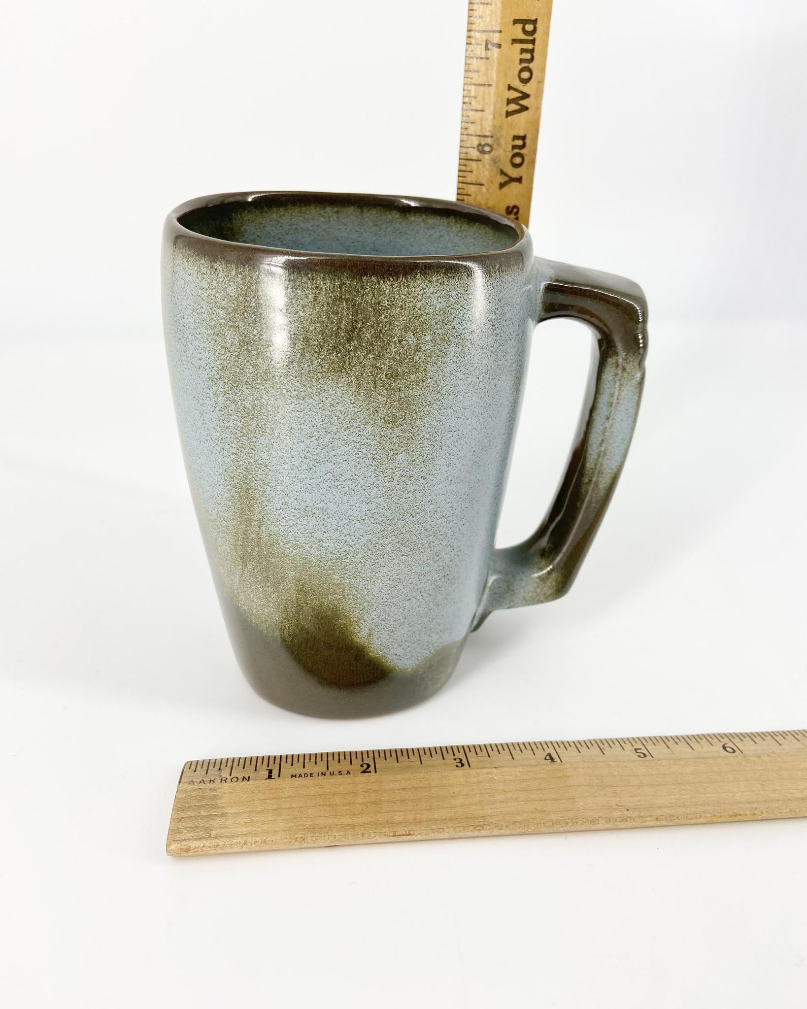 Frankoma Pottery pieces. Part of a vintage collection of 119 pieces. Collectible vintage set of Frankoma Plainsman Woodland Moss tableware.background.