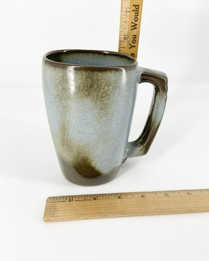 Frankoma Pottery pieces. Part of a vintage collection of 119 pieces. Collectible vintage set of Frankoma Plainsman Woodland Moss tableware.background.