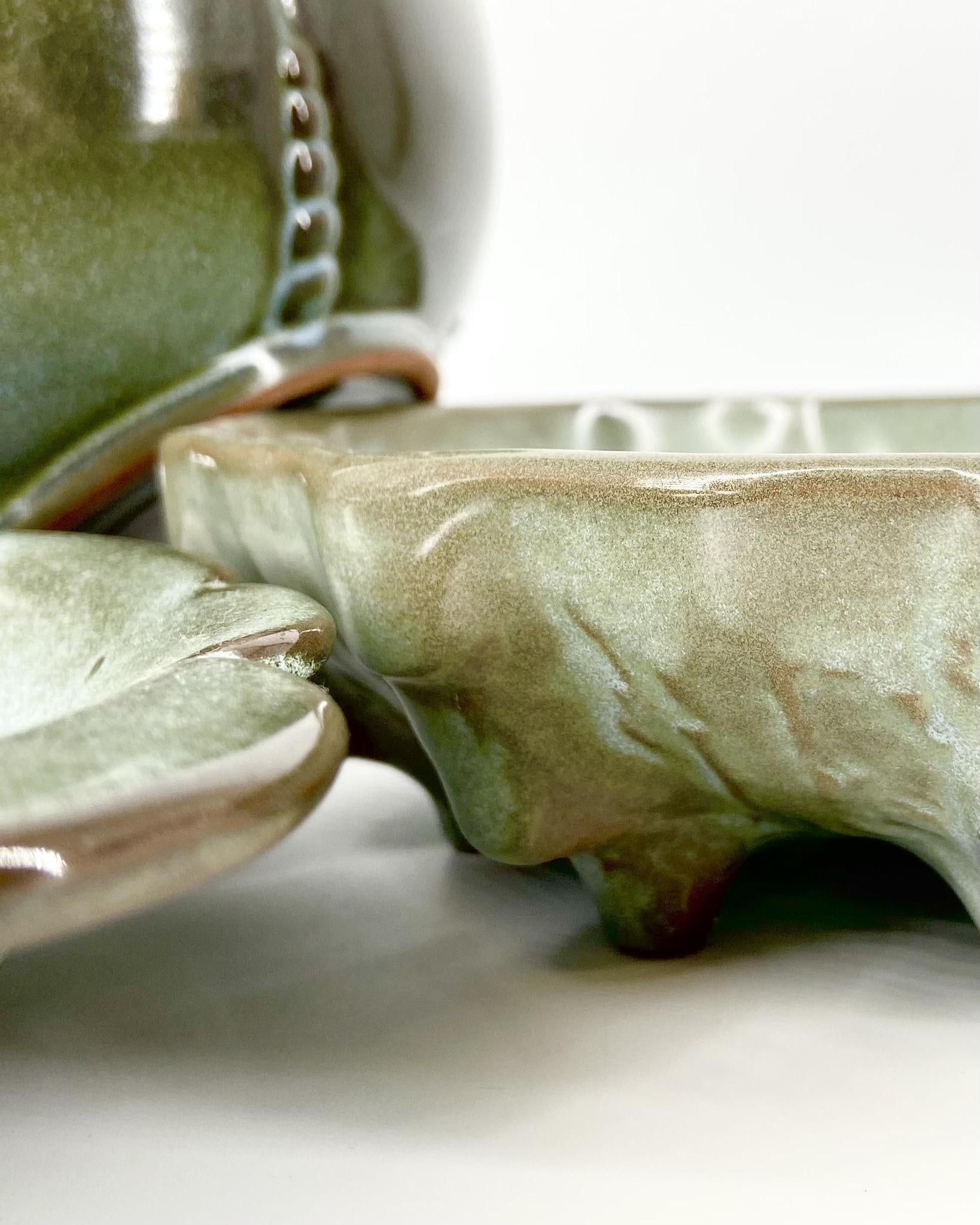 Frankoma Pottery pieces. Part of a vintage collection of 119 pieces. Collectible vintage set of Frankoma Plainsman Woodland Moss tableware.