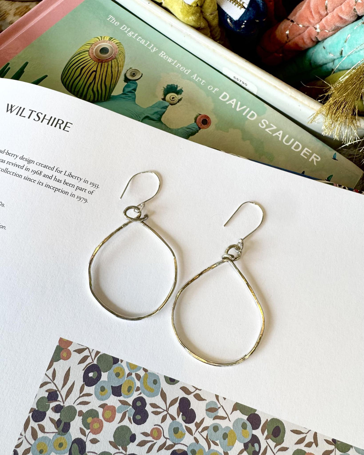 Hand-struck sterling silver earrings with organic texture, made in Kansas and curated by A STORE NAMED STUFF. Artist originals made from reclaimed sterling.