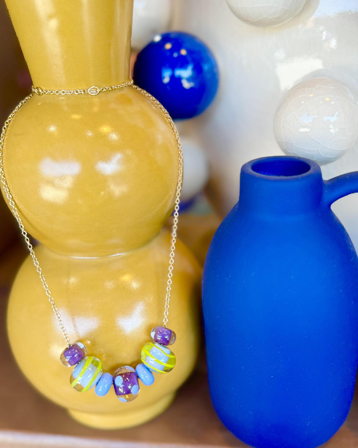 “Fancy” Lifesaver Glass Bead Necklaces

The “Fancy” necklaces are part of our playful Lifesaver Series, featuring more intricately designed key element beads that add an especially artful touch to each one-of-a-kind piece.

The graduated sizes and varied shapes of the Lifesaver beads create beautiful movement when worn. Some necklaces feature joyful monochromatic color combinations, while others mix vibrant colors for a more energetic, expressive look. Within each design, the intricate “Fancy” beads serve a