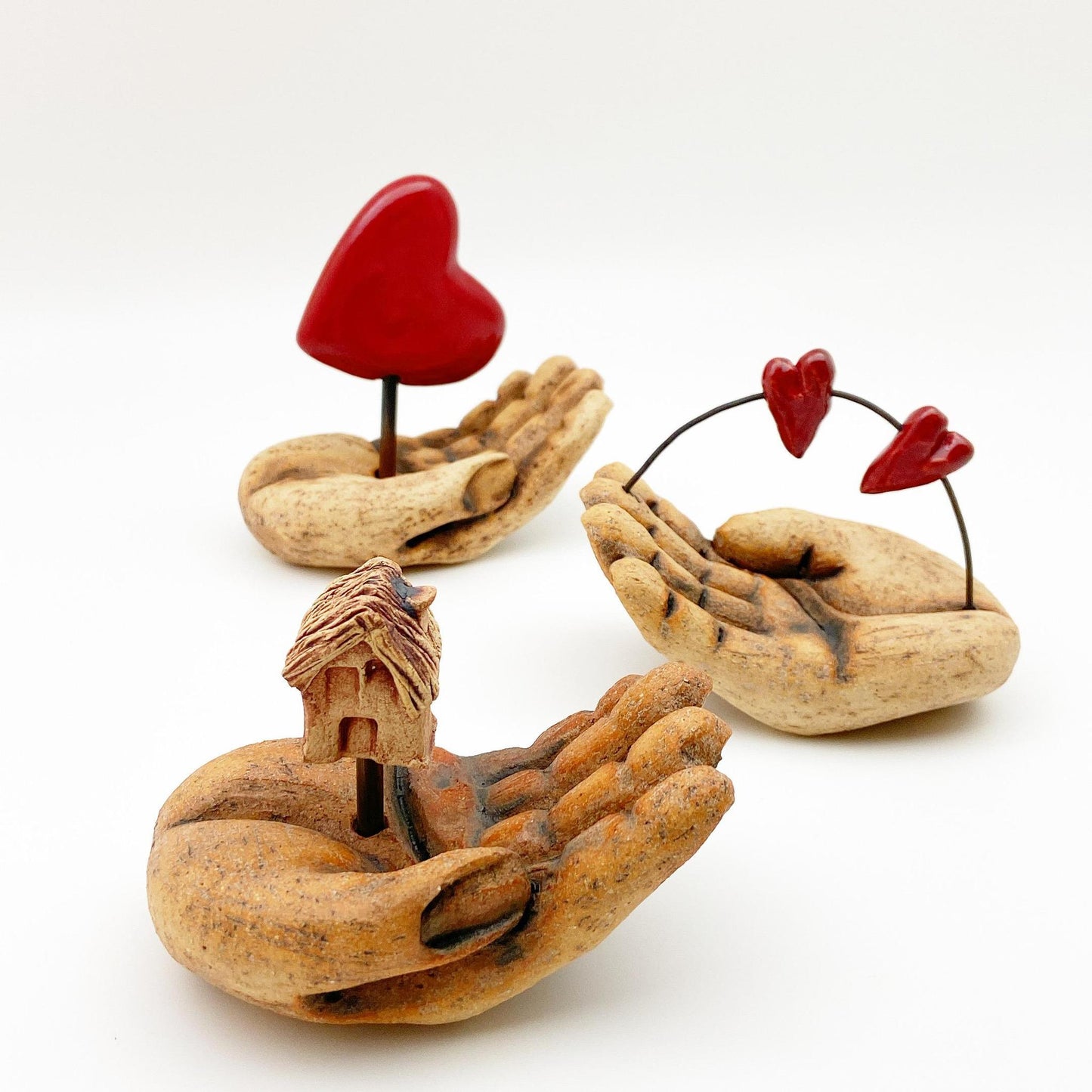 Sculpture - Strung Hearts on Hand (Small) - Ceramic