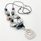 Necklace - Hand-Knotted Pearl on Leather - Sterling Swirl Pendant